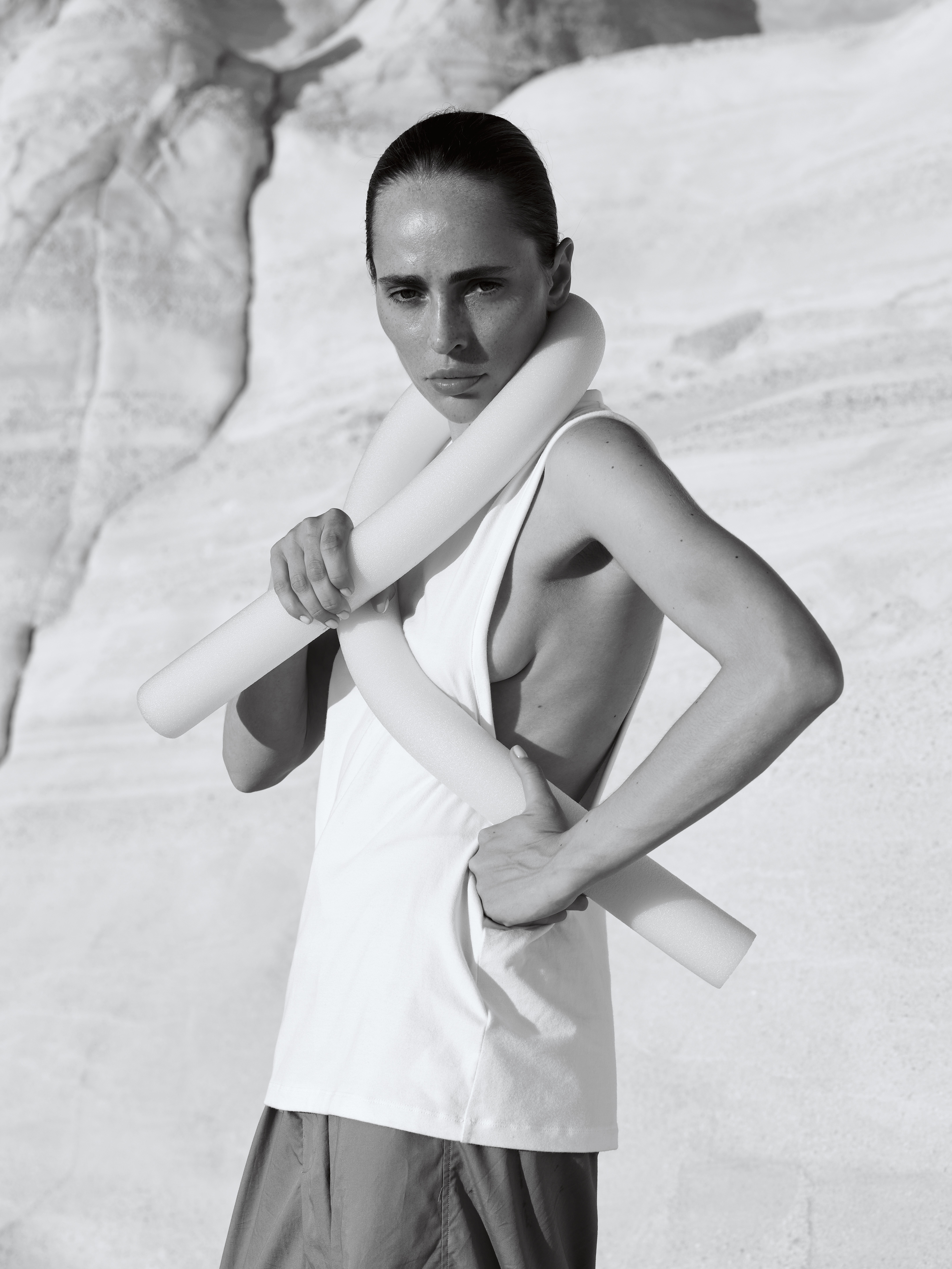Inna in a sculptural white outfit from the new series